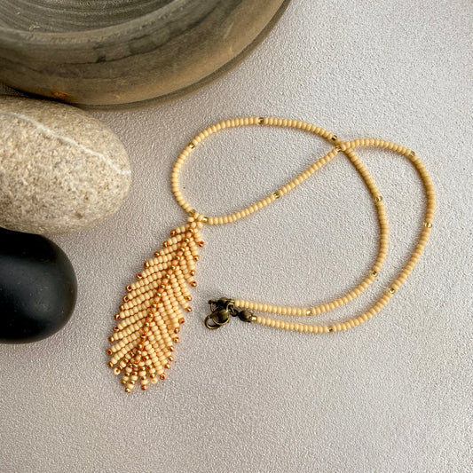 Handmade Beige Cream and Gold seed beaded Feather pendant Necklace for Woman in bohemian style. This fringe choker necklace is very cute.